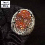 Kiss The Ring Of A Moissanite Oval Spessartine Ring