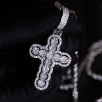 Iced Hollow Round Cut Cross Moissanite Pendant in White Gold